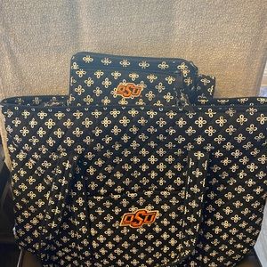 Matching Oklahoma State University Vera Bradley Zippered Vera bag and wristlet